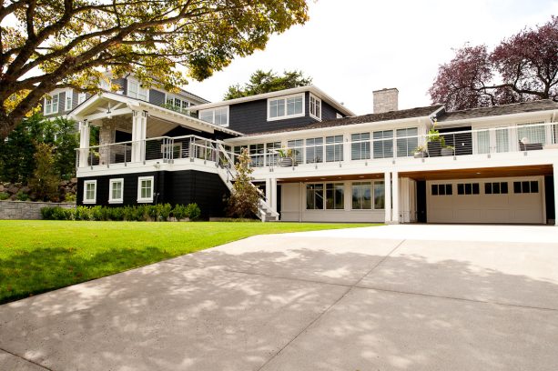 three-story ranch house with the black and white exterior color