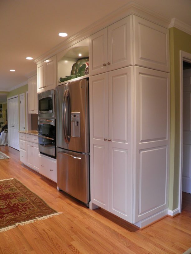 toe-kick trim in a painted maple wood kitchen cabinet