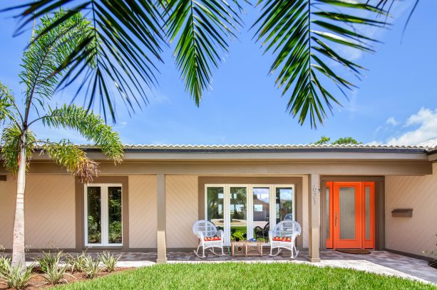 traditional ranch house with a soft orange wall