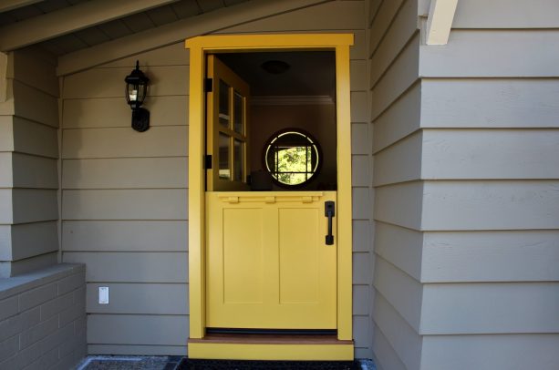 vibrant yellow dutch front door with insulated glass