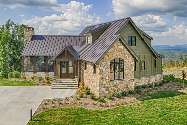 benjamin moore - aegean olive green fiberboard siding accentuated by stone wall