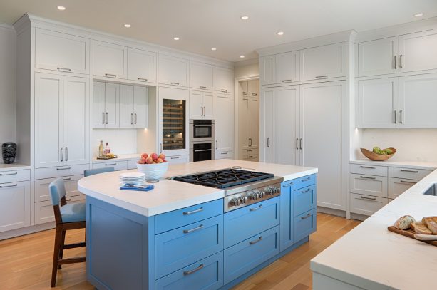 blue island cabinet to accentuate the crisp white kitchen cabinets around