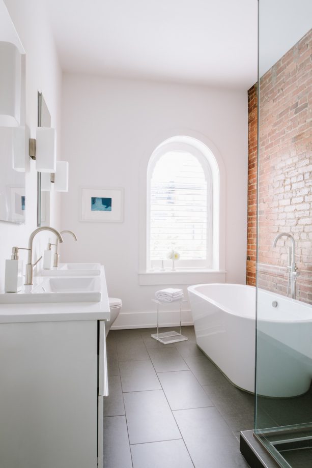 classic brick accent color for gray and white bathroom