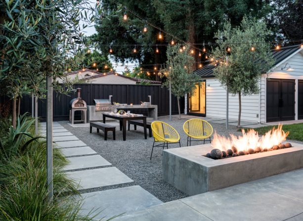 combination of pea gravel and concrete slab in a large fire pit