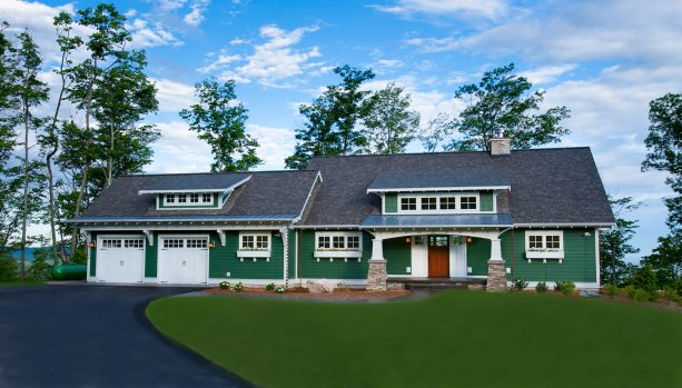 combination of pine green siding, white trim, and black roof in a craftsman house