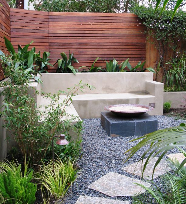 contemporary pea gravel patio with clean white sand ring of the fire pit