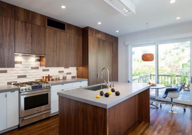 dark brown cabinets with the natural grain of the wood in a modern kitchen