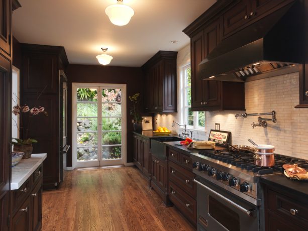 elegant kitchen with dark brown cabinets stained in “peppercorn” and made of lyptus wood