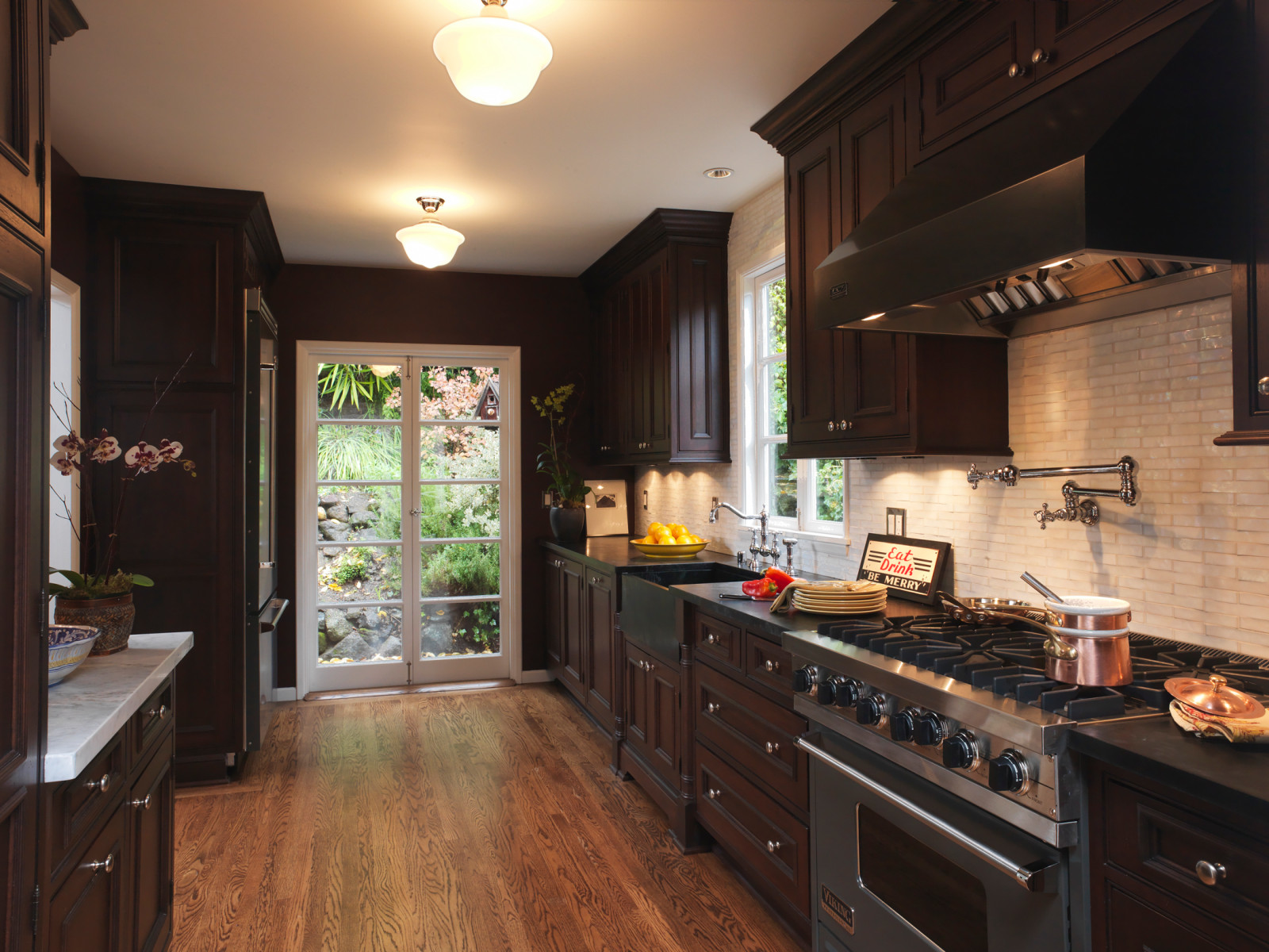 grey granite countertops with brown cabinets