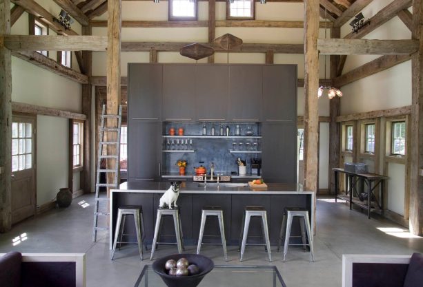 modern kitchen with flat panel dark gray cabinets and stainless steel countertops