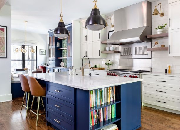 sherwin williams - naval blue island cabinet as a bold statement in a bright white kitchen