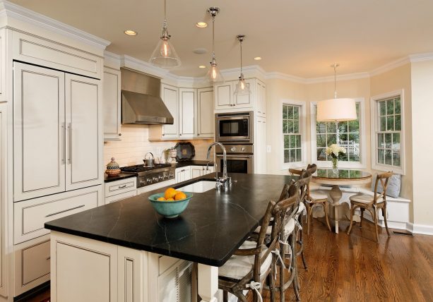 small breakfast nook bay with a round dining table for two