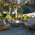 traditional pea gravel fire pit with a set of comfortable seats