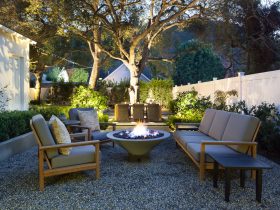 traditional pea gravel fire pit with a set of comfortable seats