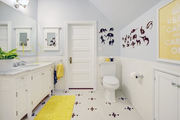 yellow accent color for gray and white bathroom
