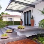 applying microdeck on top of the concrete slab to create a clean front porch look