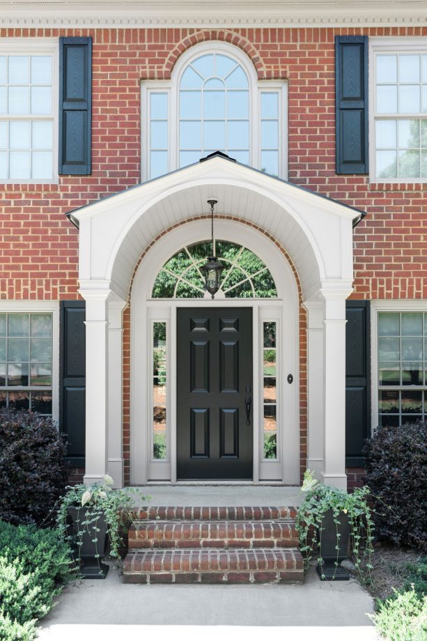 black and white color scheme in a front door portico with glass element