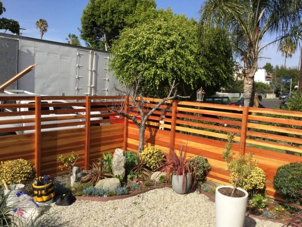 clear redwood corner fence to separate the property from the surrounding neighborhood