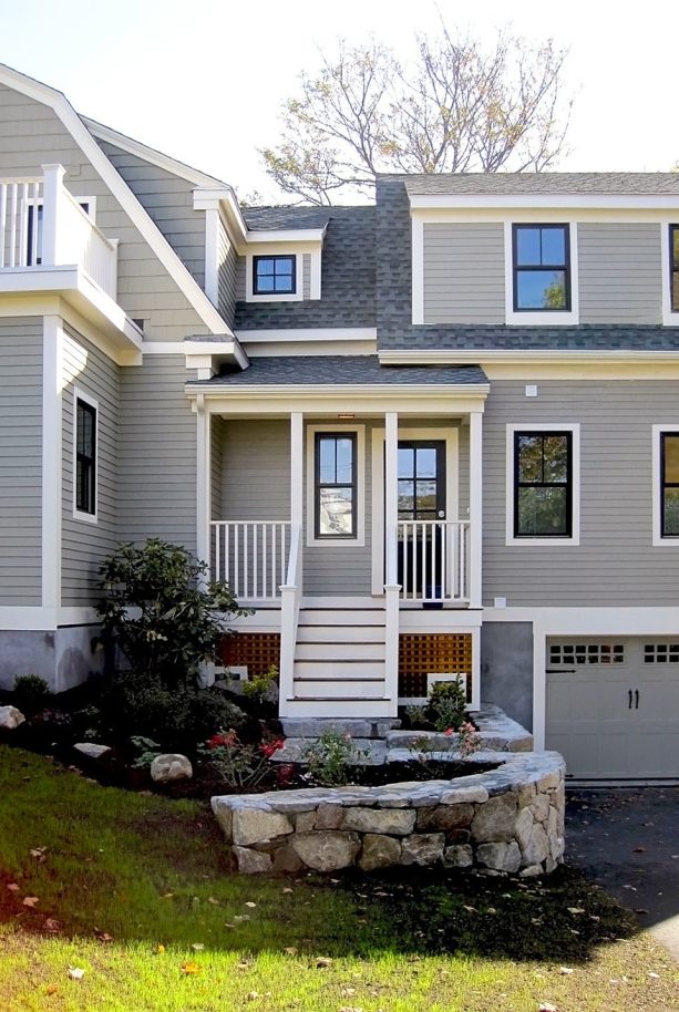 combination of the black window, white trim, and gray siding