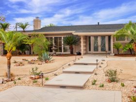 concrete paver landscaping with decomposed granite in a grassless front yard