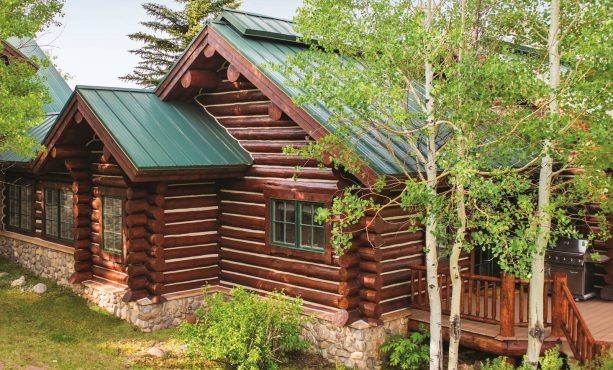 corrugated metal roof in green color for a large log cabin