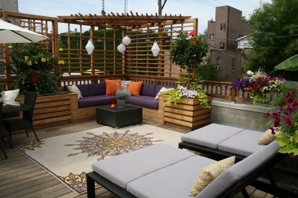 extended corner wooden fence above the railing completed with overhead wood planks