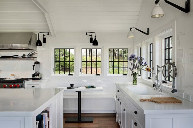 grid glass panel windows in black with white trim to create a modern farmhouse style