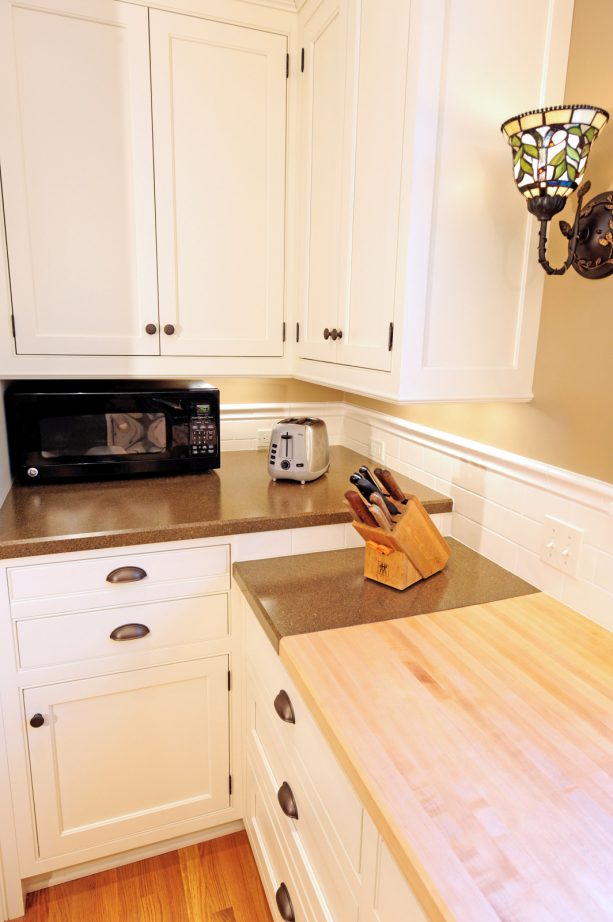 integrated butcher block and laminate countertops in different levels without backsplash