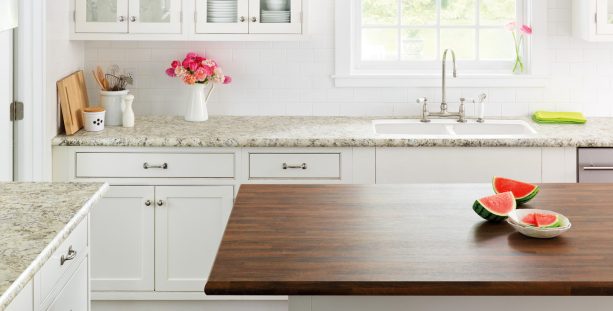 laminate countertop in typhoon ice for the perimeter and old mill oak for the island without backsplash