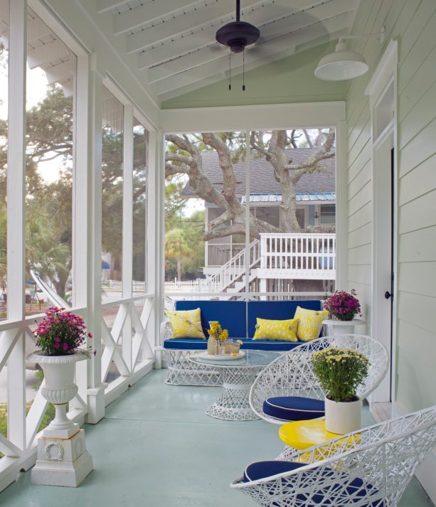 painting the concrete floor and adding a pop of color to the front porch