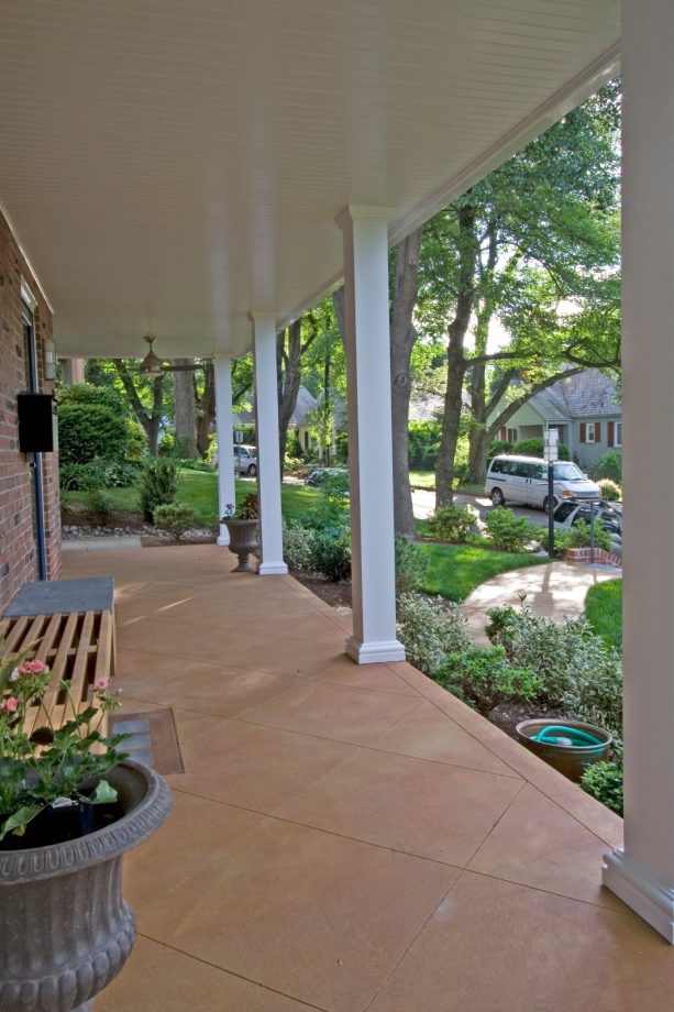 staining the concrete to mimic the tile as a minimalist front porch