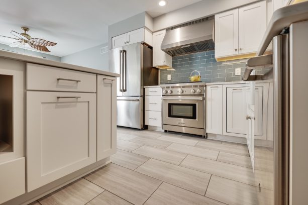 vinyl tile flooring in beige color to accentuate the white cabinets