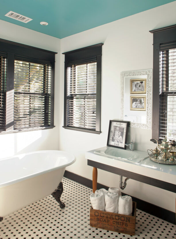 black bathroom window trim in an all-white design