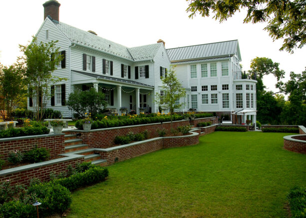 brick tiered retaining wall with bluestone cap