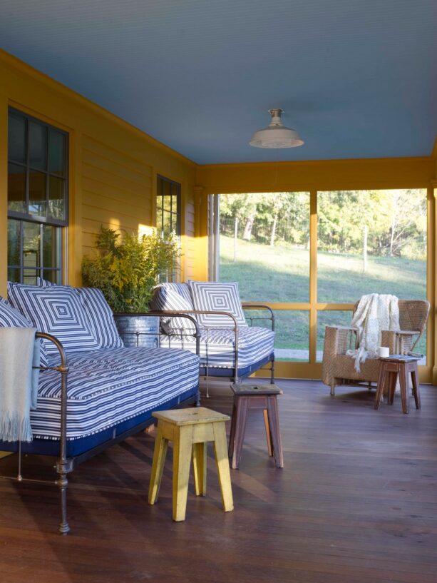 iron beds, stools, and a chair as a county front porch seating