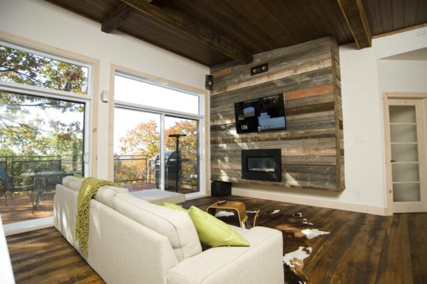 raised tv accent wall made of a 150-year-old barn