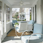 retro squares spring seating in a bright and fresh screened-in front porch