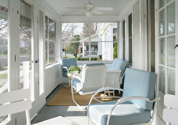 retro squares spring seating in a bright and fresh screened-in front porch