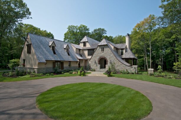 simple circular lawn landscaping in the center of a driveway