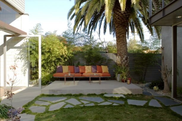 simple yet trendy raised patio made of concrete with bright bench