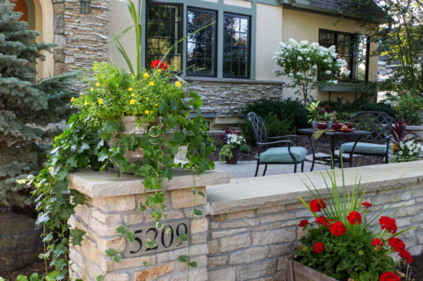 adding privacy in your front yard with a low mortared limestone wall