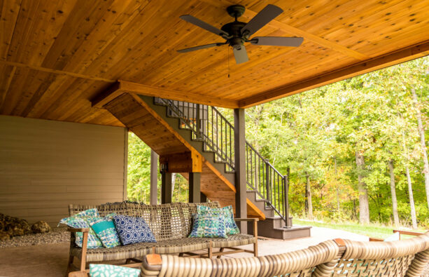 screen room with a retractable screen in under deck patio