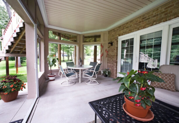 screened in porch in an under deck patio
