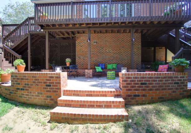 stone paver under deck patio with a splash of colors