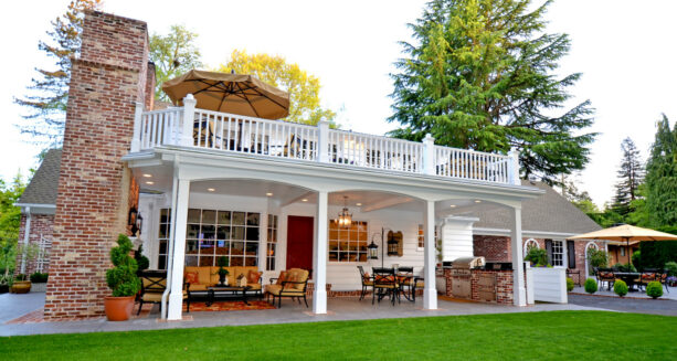 the large under deck patio is divided into some different zones