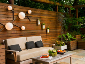wood panel patio wall with decorative lights
