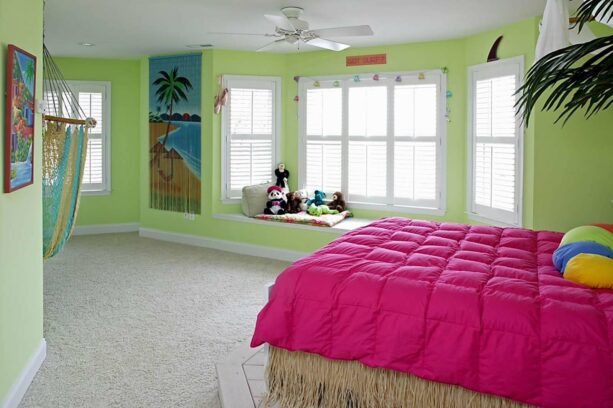a combination of light green and bright pink shade in a bedroom