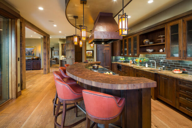 a pretty curved breakfast bar in a galley kitchen