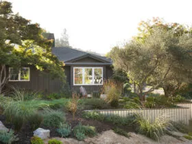 a single retaining wall made of corrugated metal with a cap