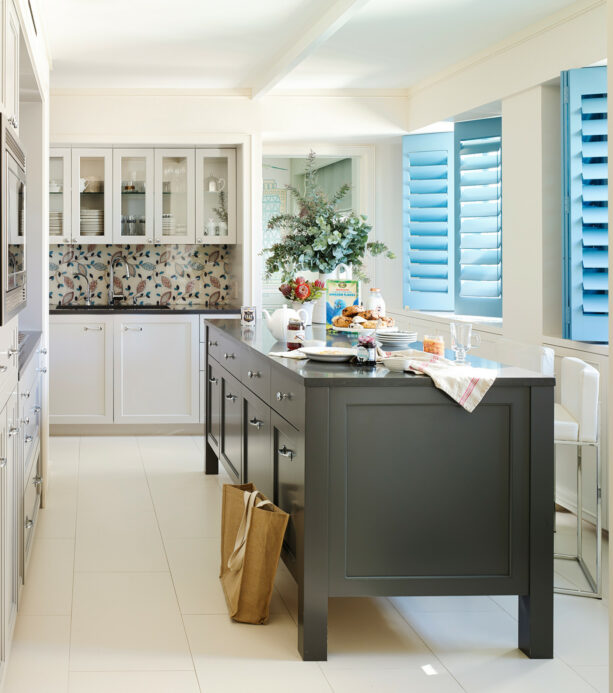 blue-colored plantation kitchen window shutters